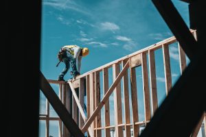 Construction worker balancing from a height