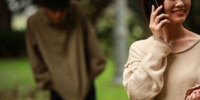 Man stalking woman while she's on the phone